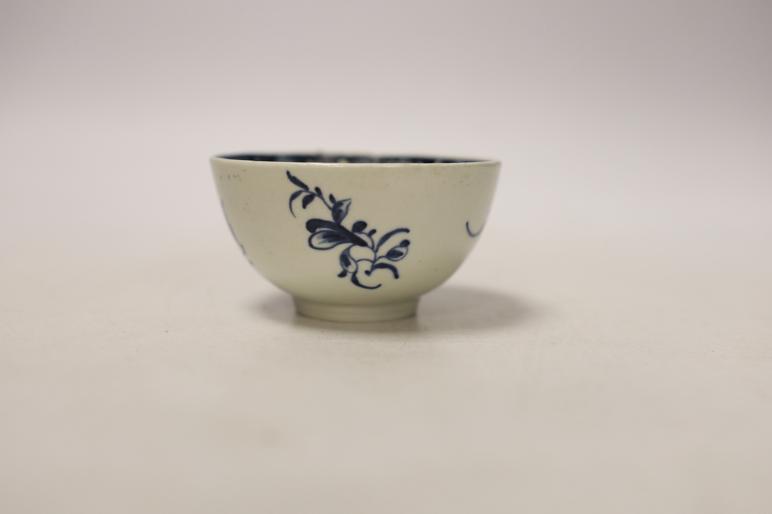 A Worcester tea bowl, Mansfield pattern and a saucer, Fruit and Flower pattern